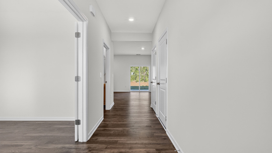 foyer entryway with revwood flooring