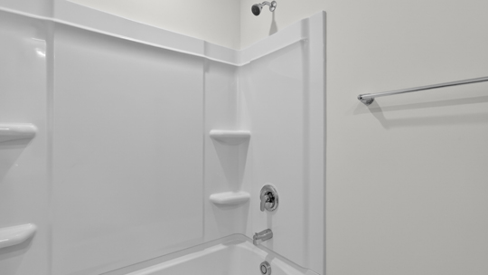 bathroom with tub shower combo