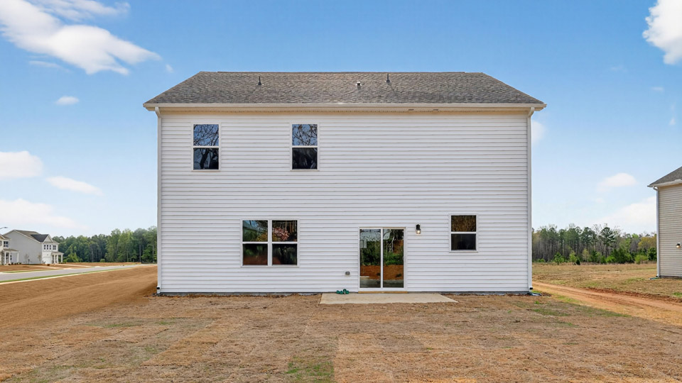 View of the back of the home and back patio