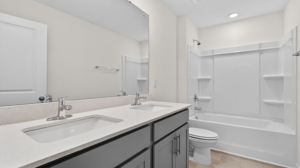 Bathroom with sink and tub