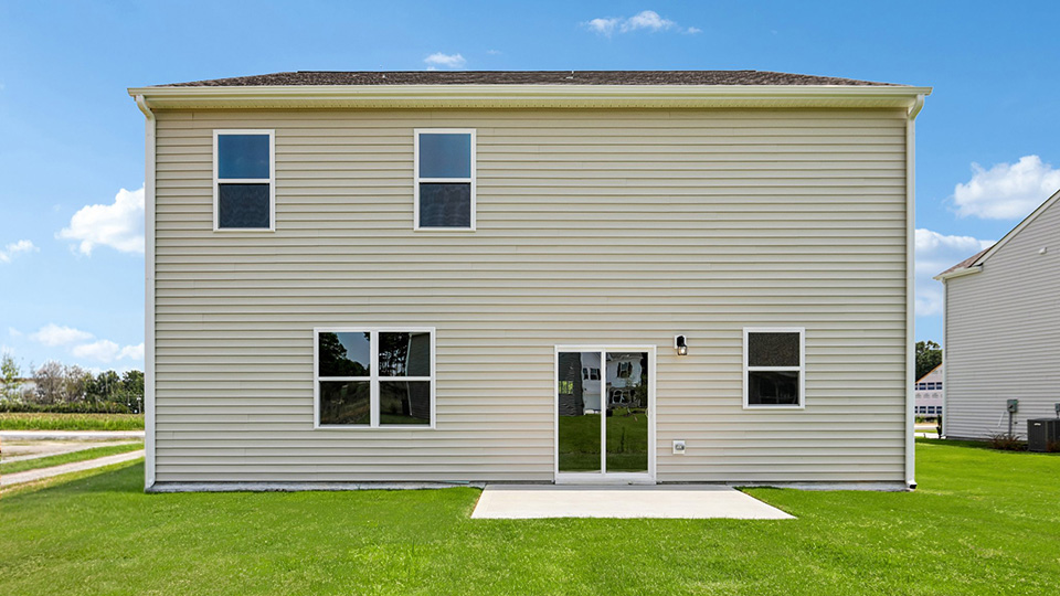 back exterior with concrete patio
