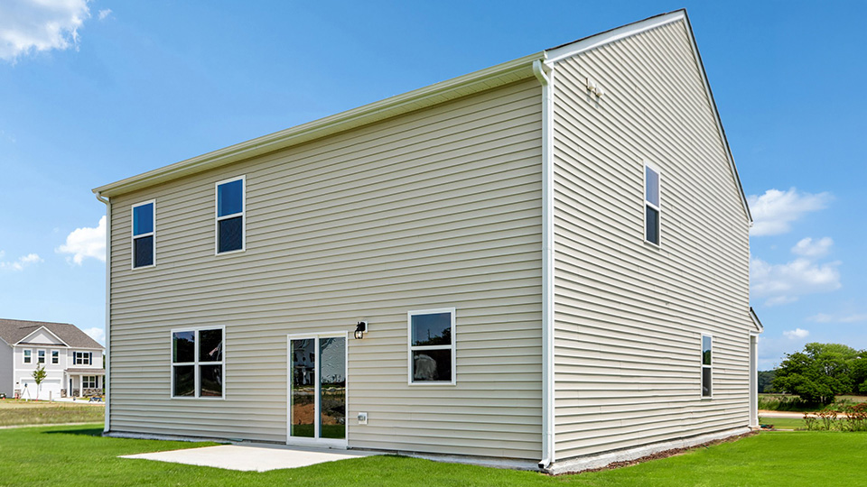 back exterior with concrete patio