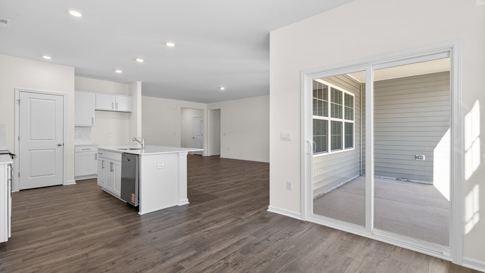 Dining room area with sliding glass door that leads to back patio