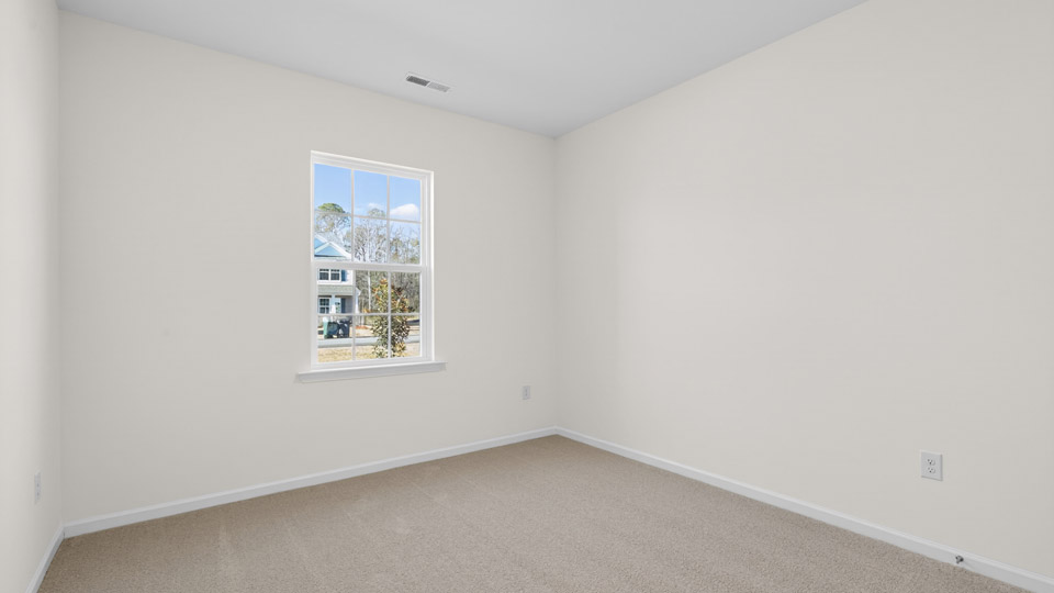 Bedroom with carpet floor and closet