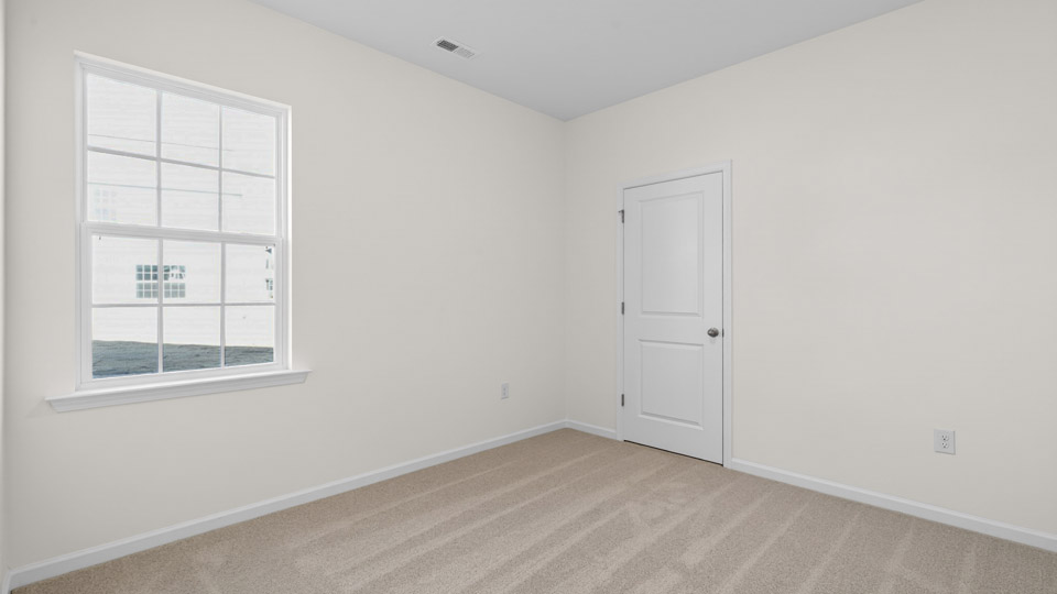 Bedroom with carpet floor and closet