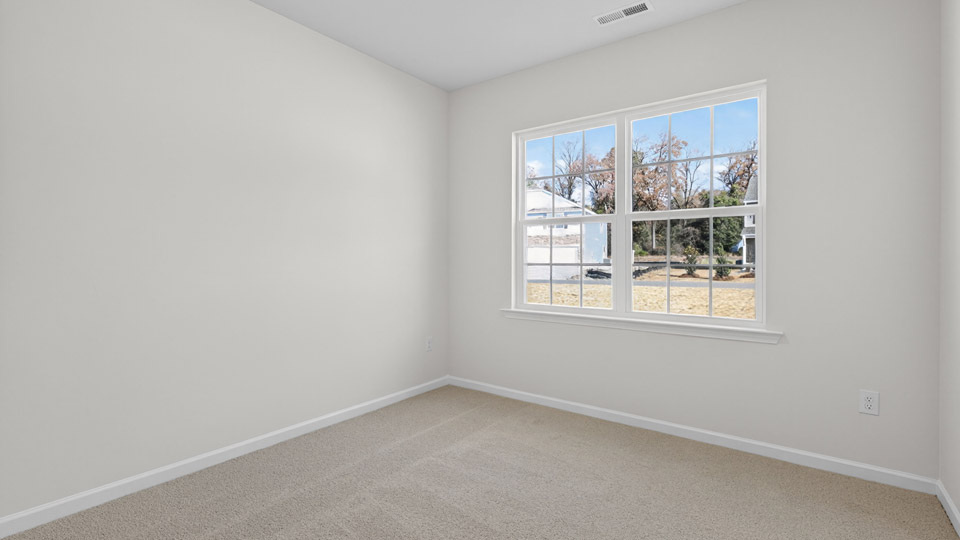Bedroom with carpet floor and closet