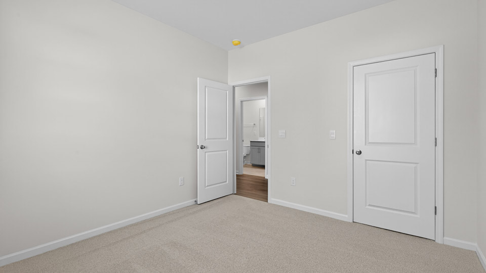 Bedroom with carpet floor and closet