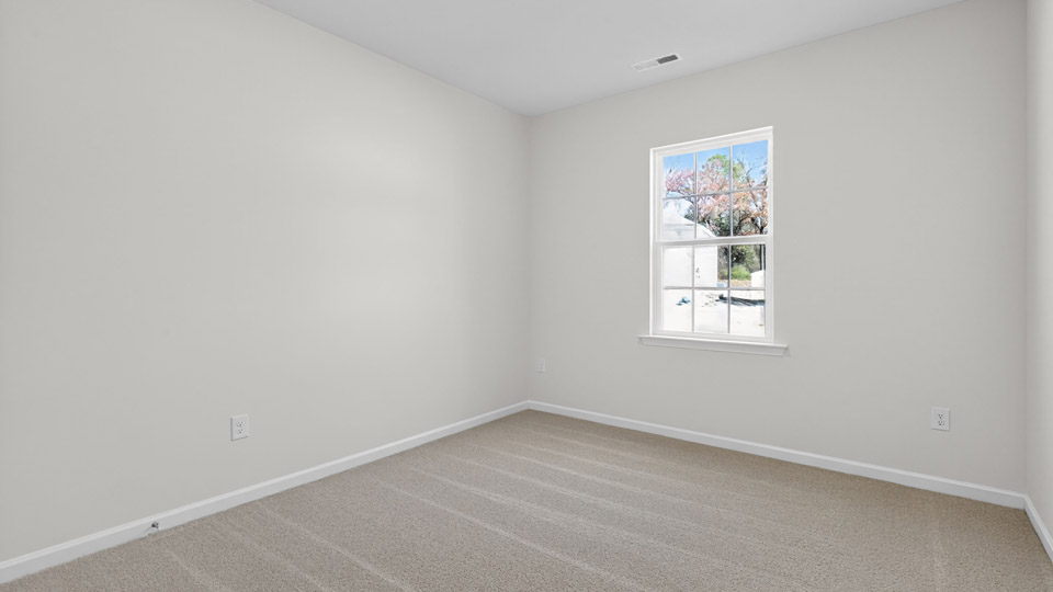 Bedroom with carpet floor and closet