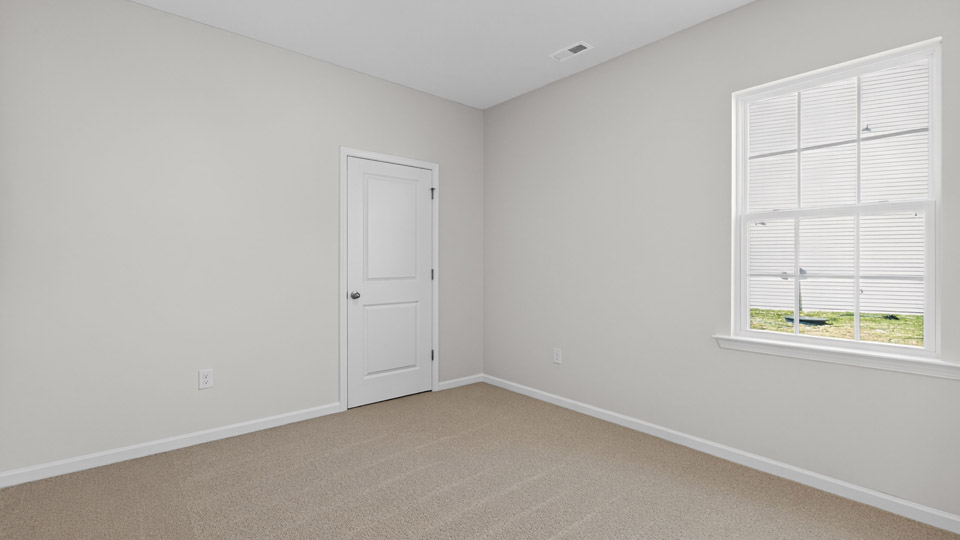 Bedroom with carpet floor and closet