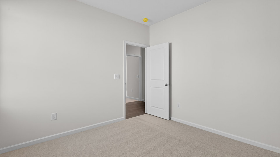 Bedroom with carpet floor and closet