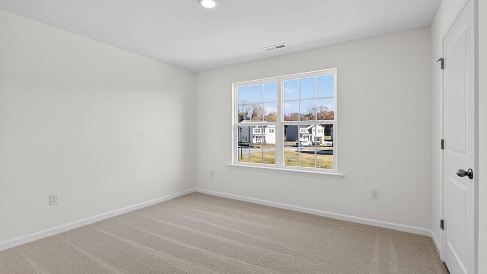 Bedroom with carpet floor and closet