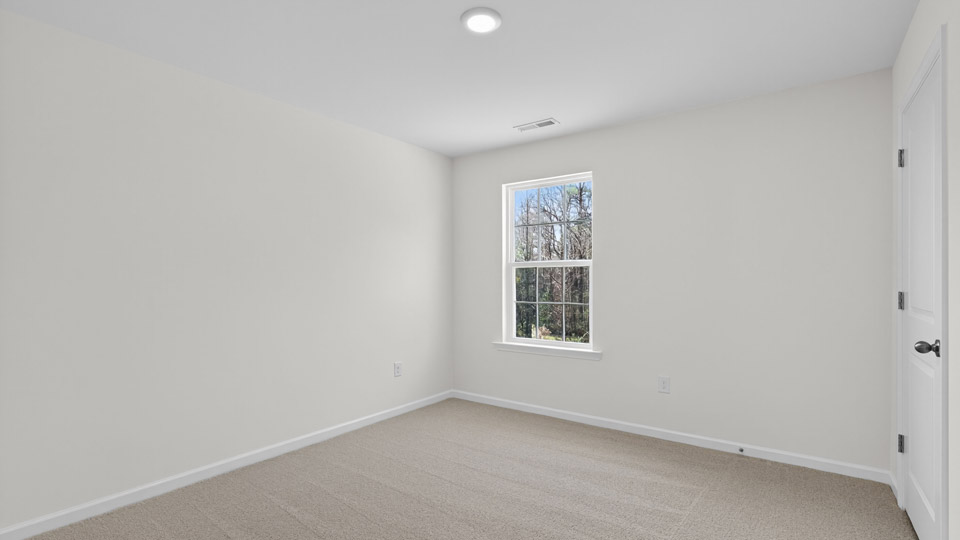 Bedroom with carpet floor and closet