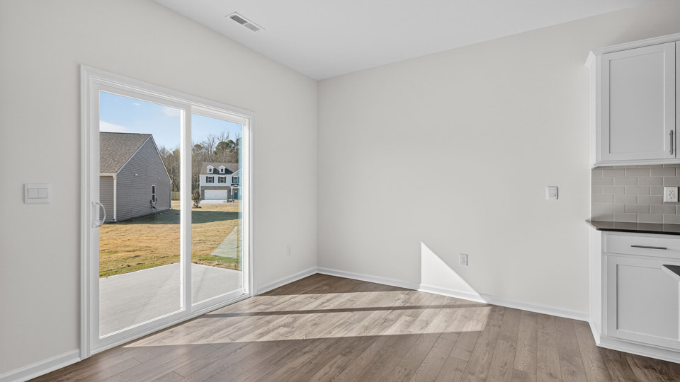 Sliding glass back door leading to back patio