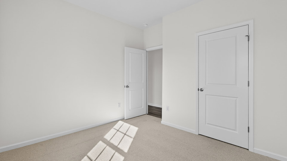 Bedroom with carpet floor and closet