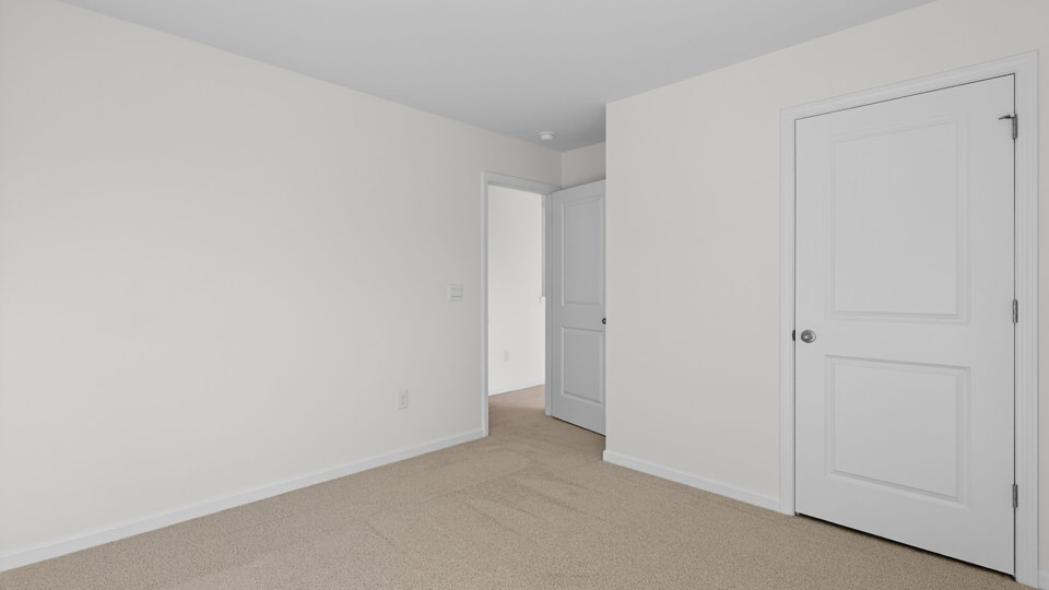 Bedroom with carpet floor and closet