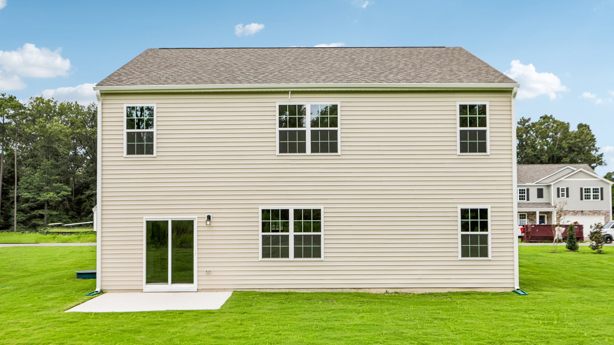 back of hayden with concrete patio