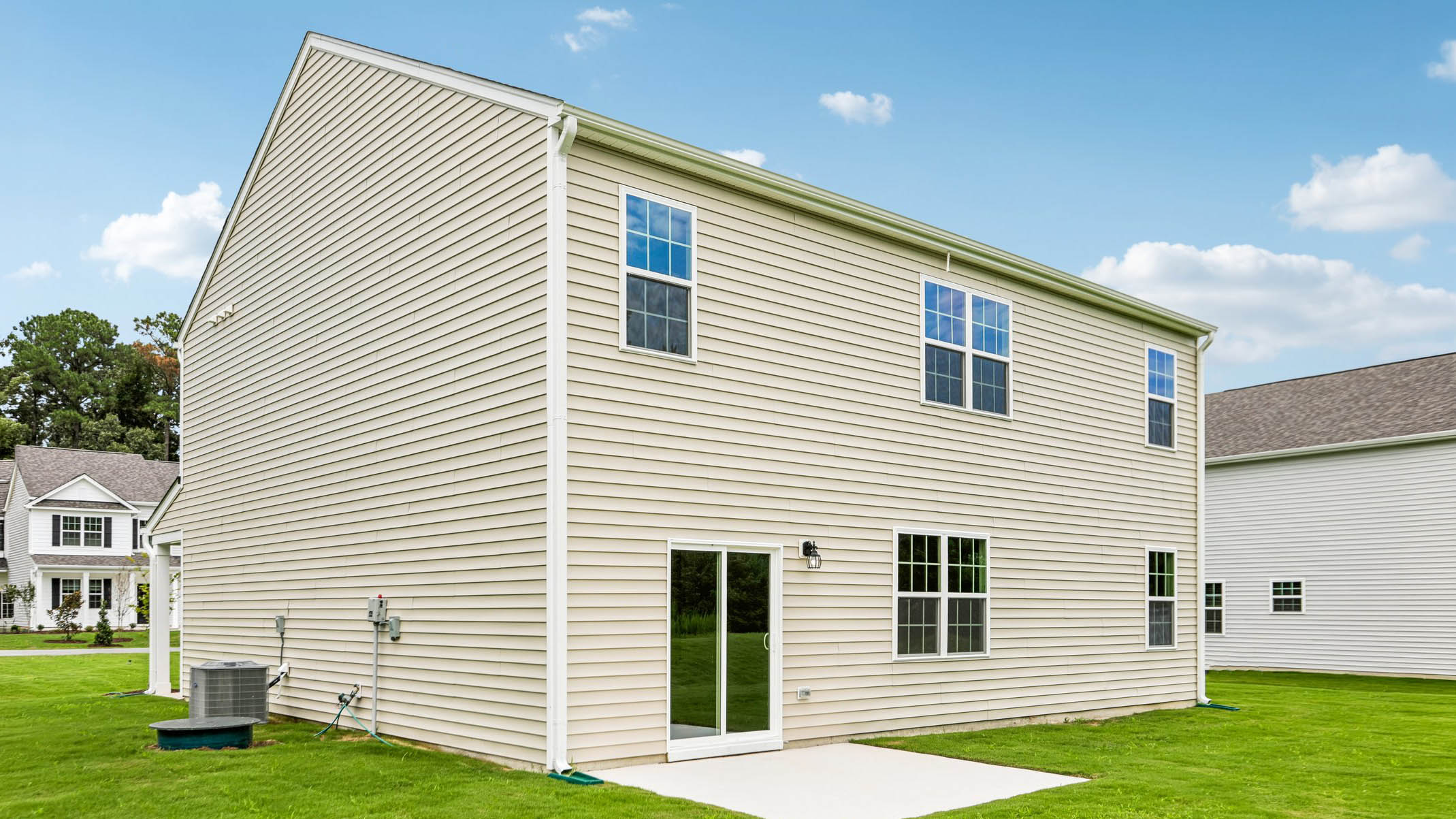 back of hayden with concrete patio