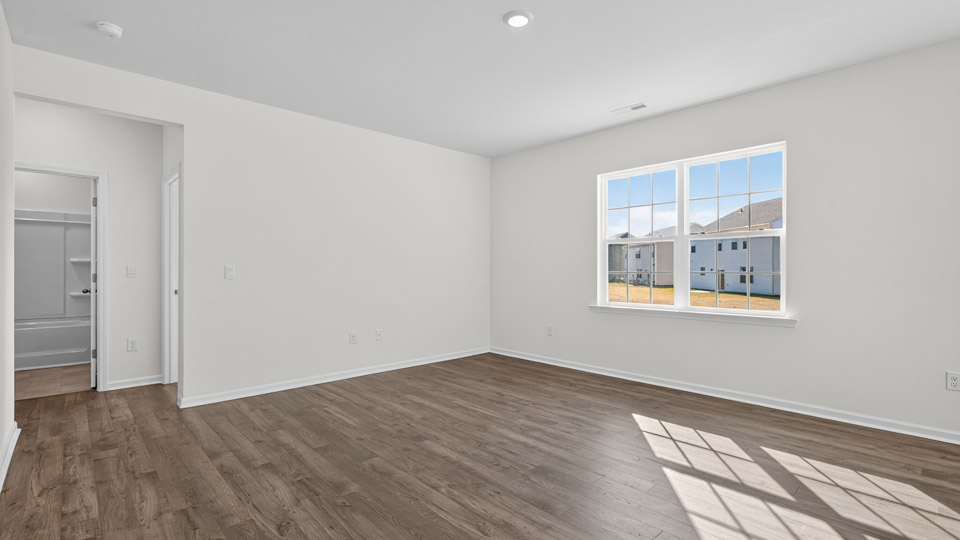 open concept living space with large windows