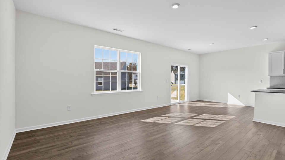 open concept living space with large windows