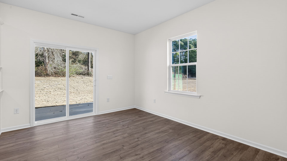 Sliding glass back door leading to back patio