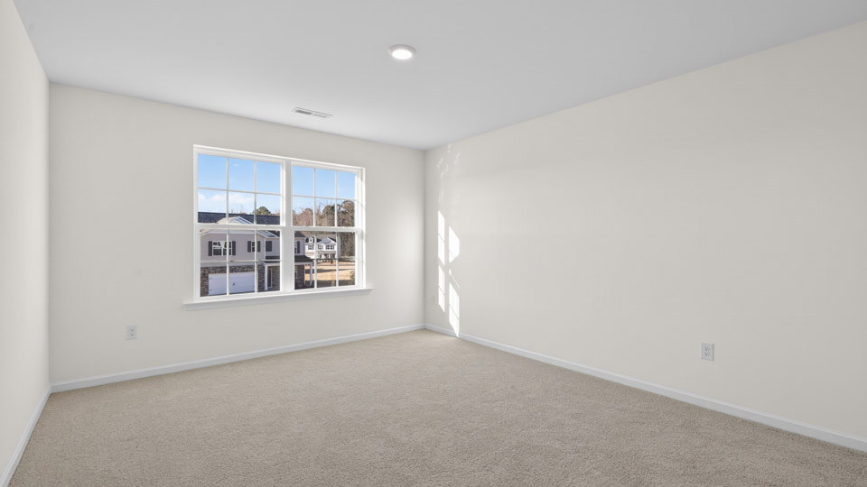 Bedroom with carpet floor and closet