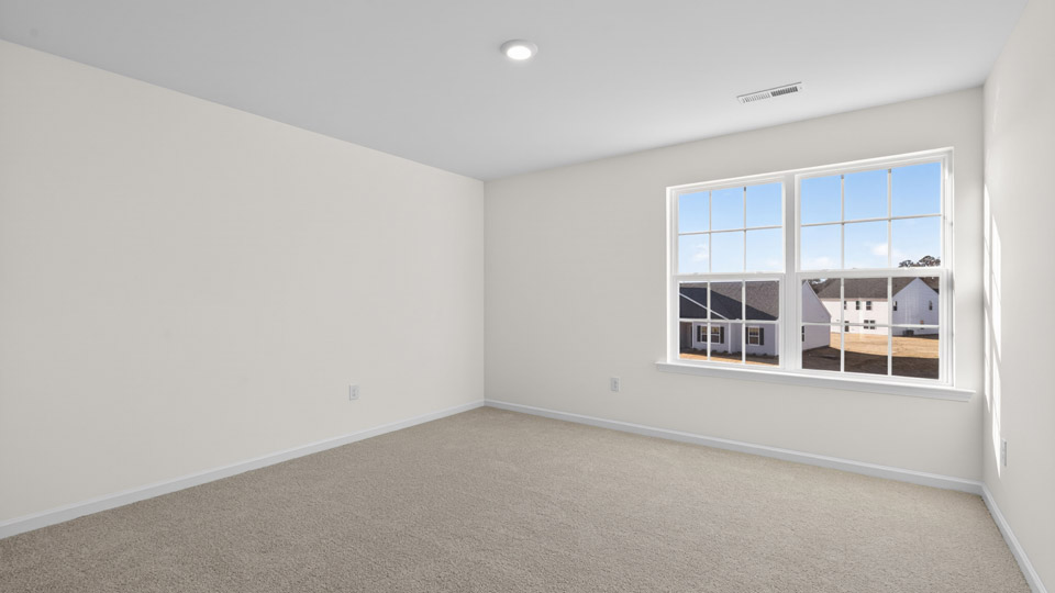 Bedroom with carpet floor and closet