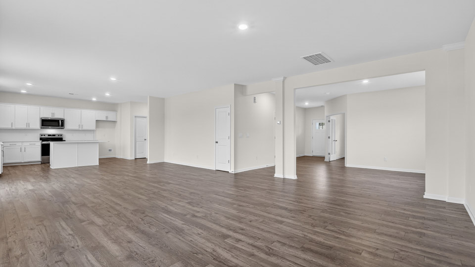 open concept living space with large windows