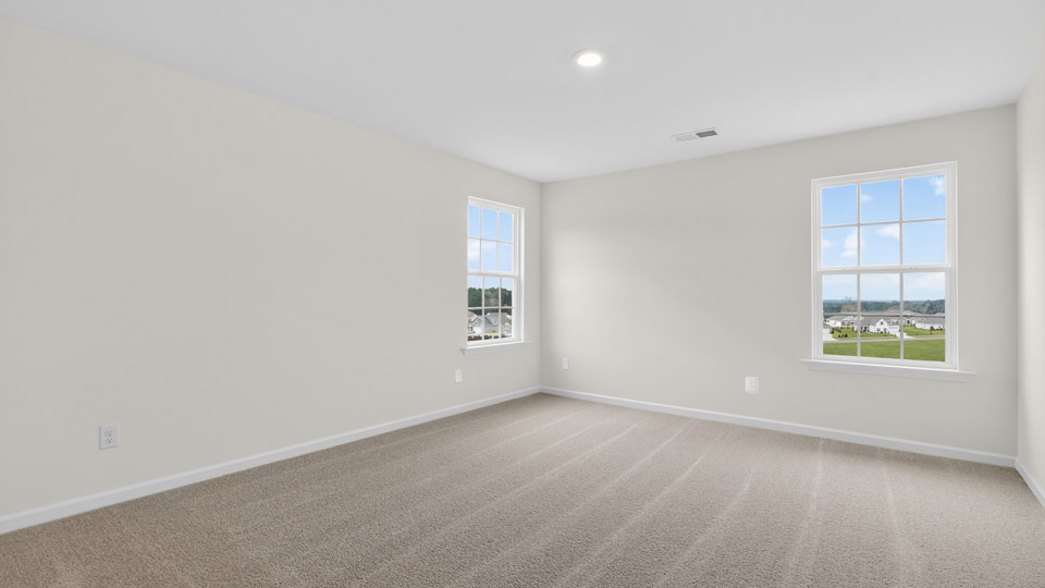 additional bedroom with window, carpeting, closet