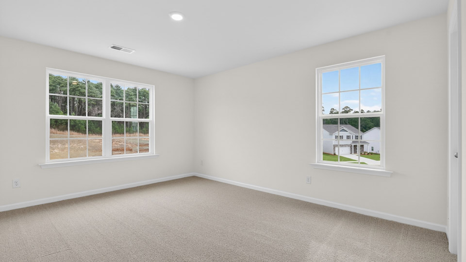 additional bedroom with window, carpeting, closet