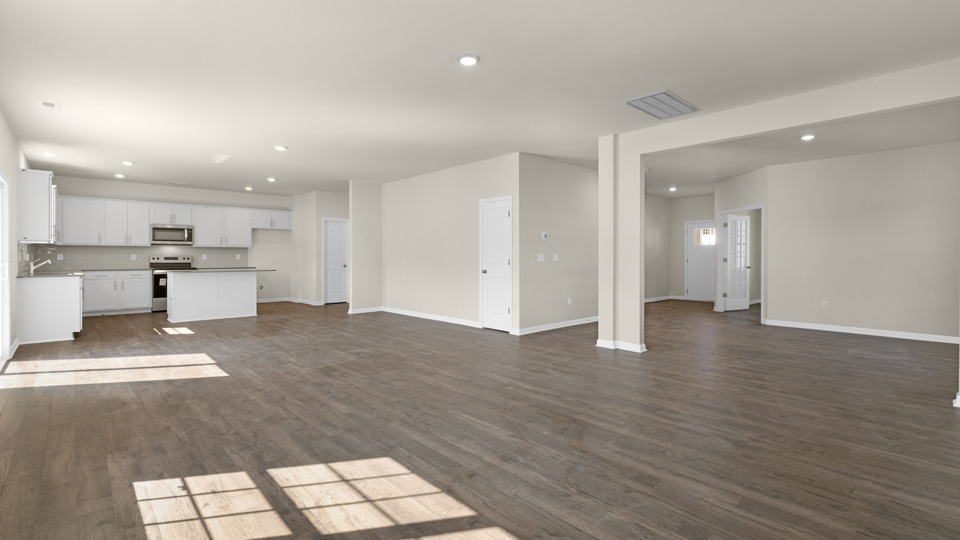 open concept living space with large windows