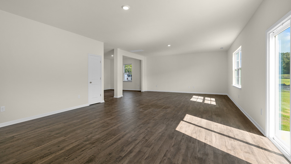 open concept living space with large windows