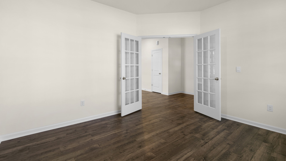 flex room with large windows, french doors