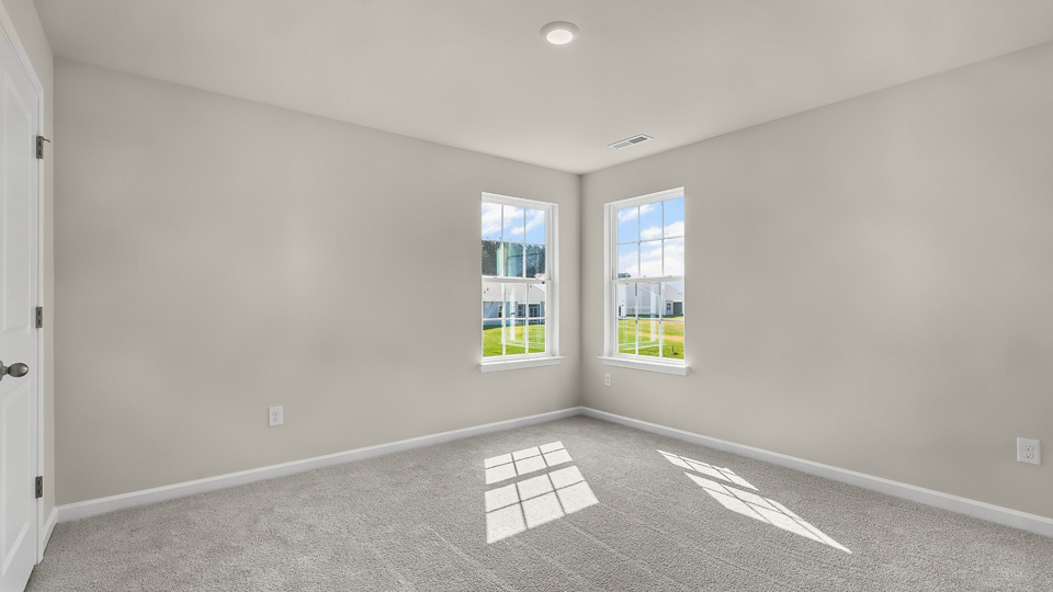 additional bedroom with window, carpeting, closet