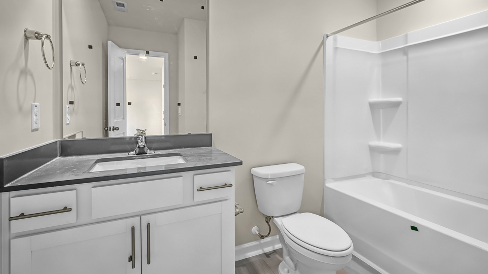 additional bathroom with single vanity sink