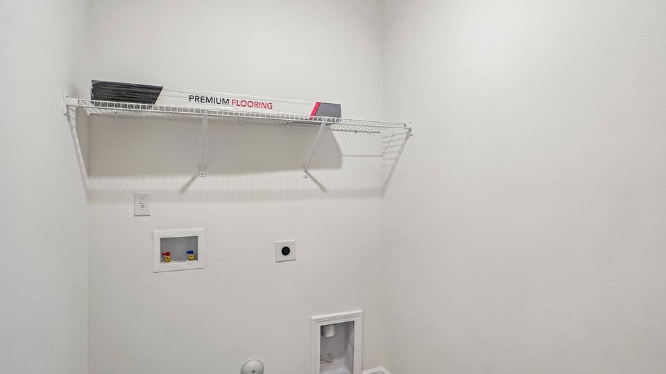 laundry room with wire shelving