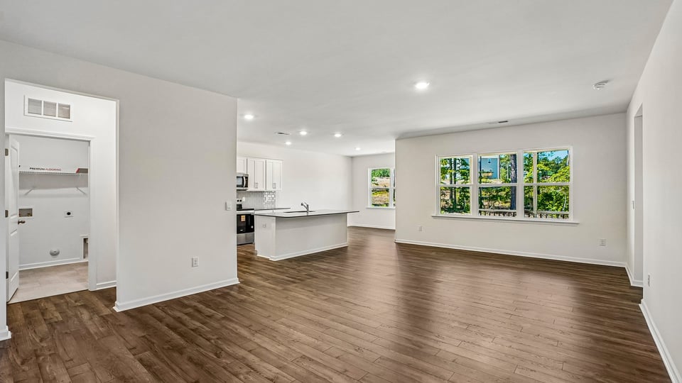 open concept living space with large windows