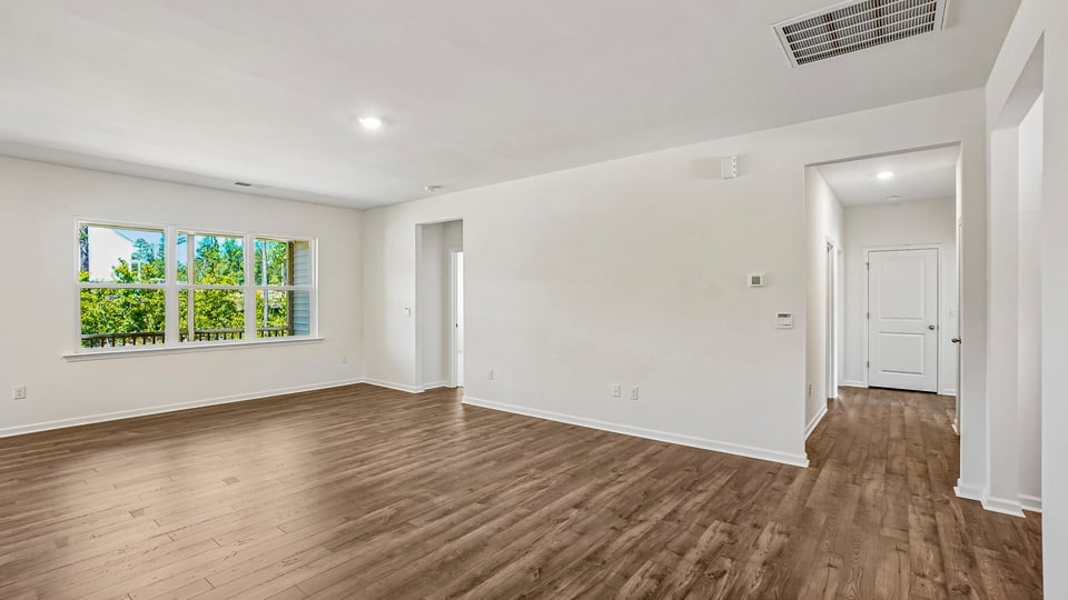 open concept living space with large windows