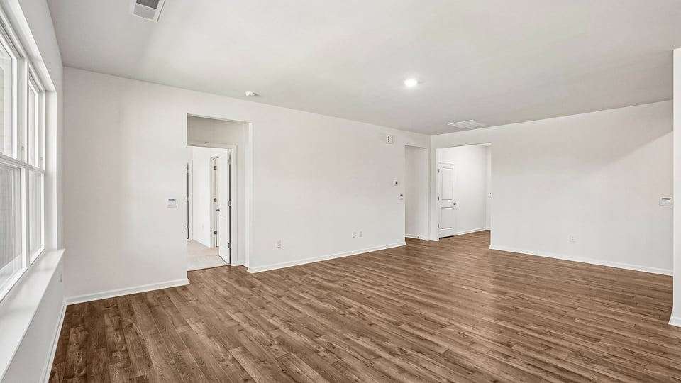 open concept living space with large windows