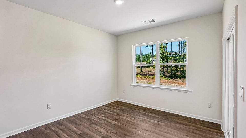 open concept dining space with door to patio