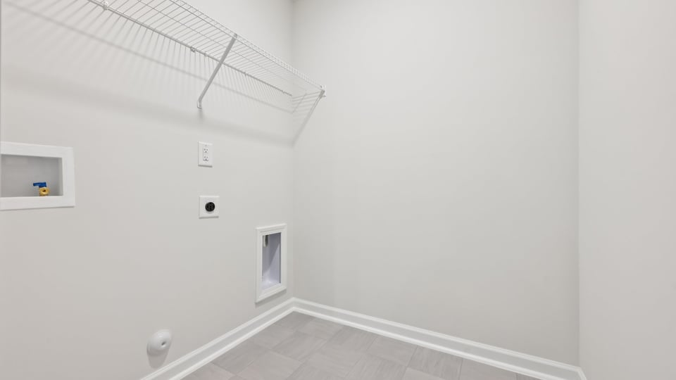 laundry room with wire shelving