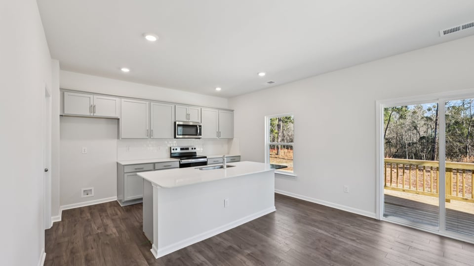 kitchen with gray cabinets quartz countertops and kitchen island