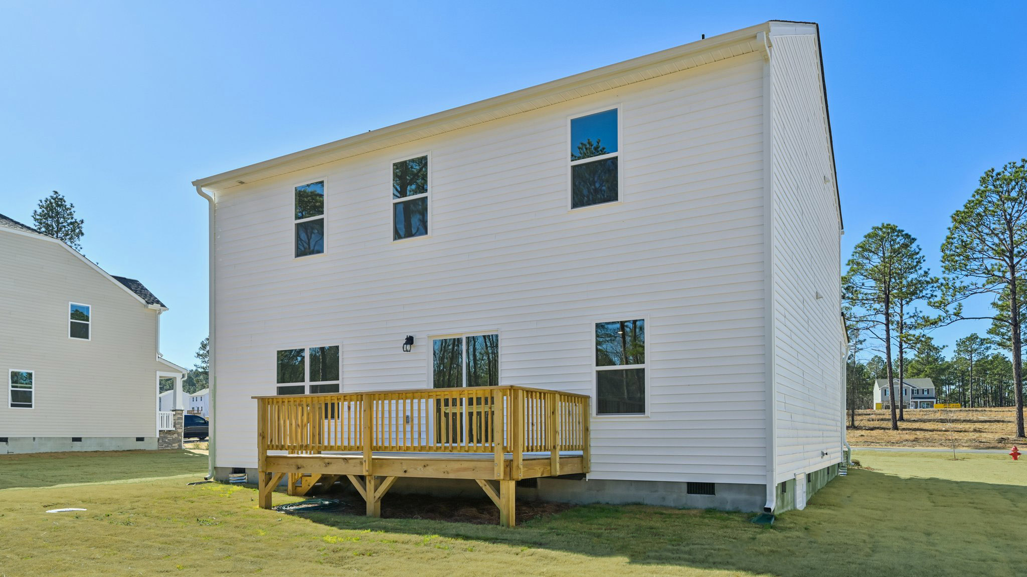 backyard with uncovered back deck
