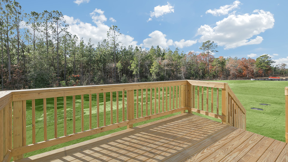 deck with large yard