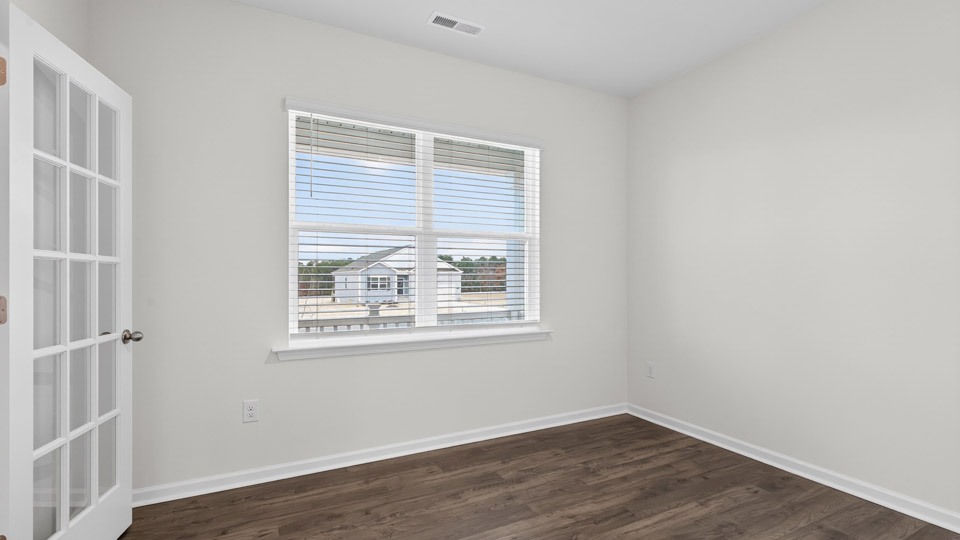 flex room with large windows, french doors