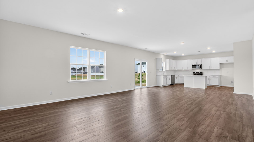 open concept living space with large windows