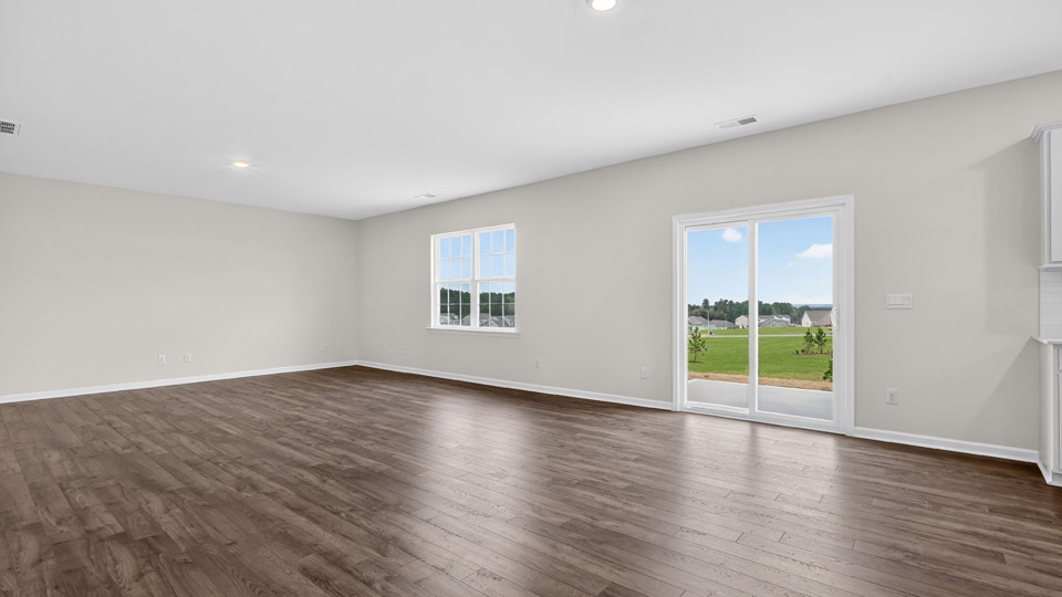 open concept dining space with sliding glass door to patio