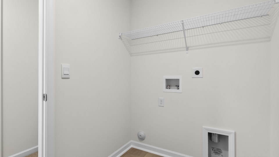 laundry room with wire shelving