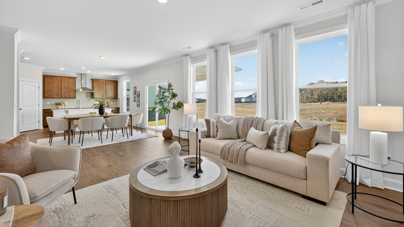 living room with revwood flooring and open-concept