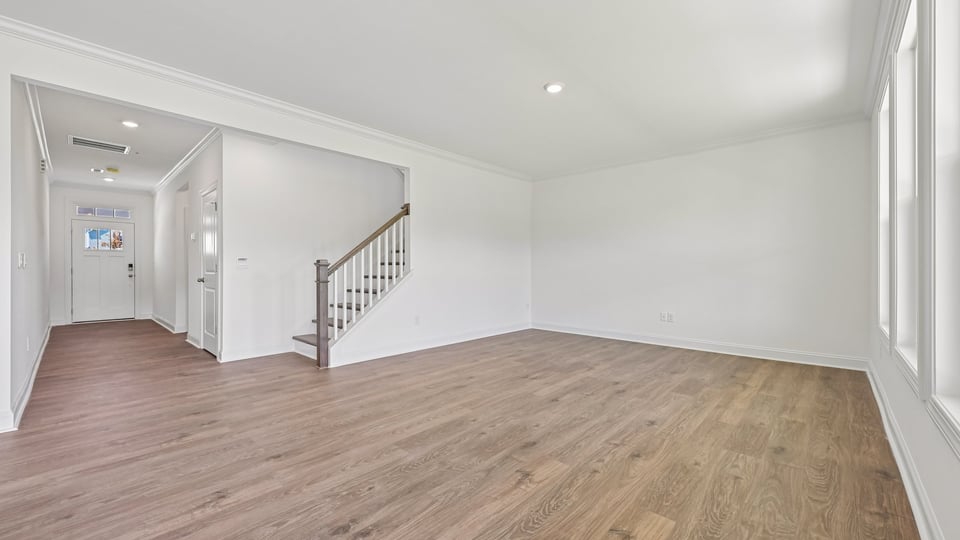 living room with revwood flooring