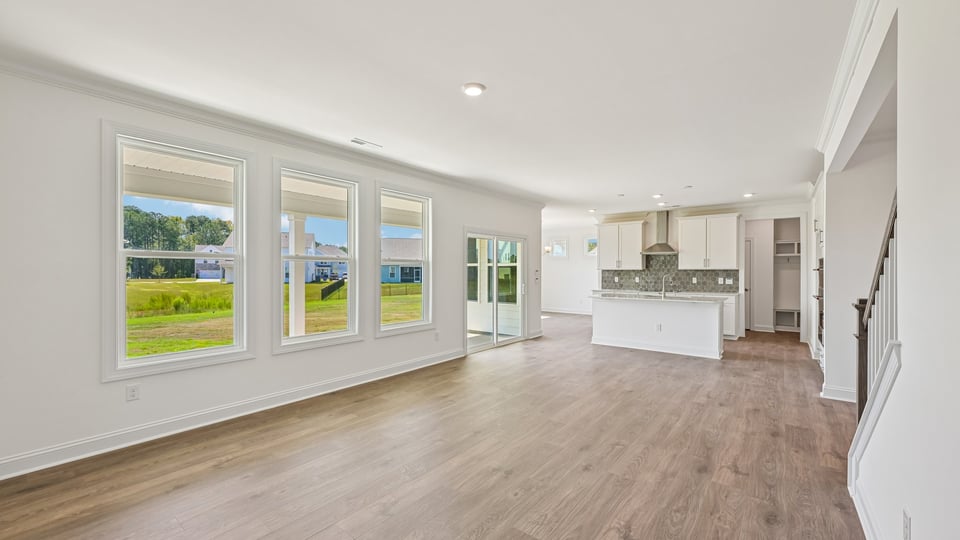 kitchen overlooking spacious living room